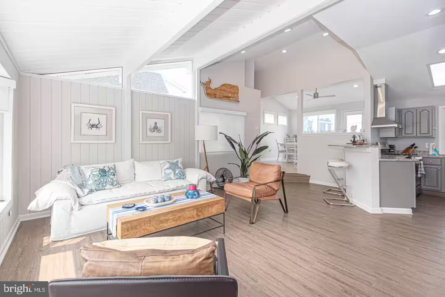10609 Pine Needle Road Ocean City, MD 21842 - Photo 14 of 26 a living room with furniture and wooden floor