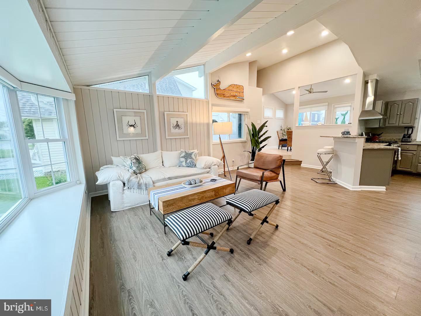 10609 Pine Needle Road Ocean City, MD 21842 - Photo 15 of 26 a living room with furniture and wooden floor