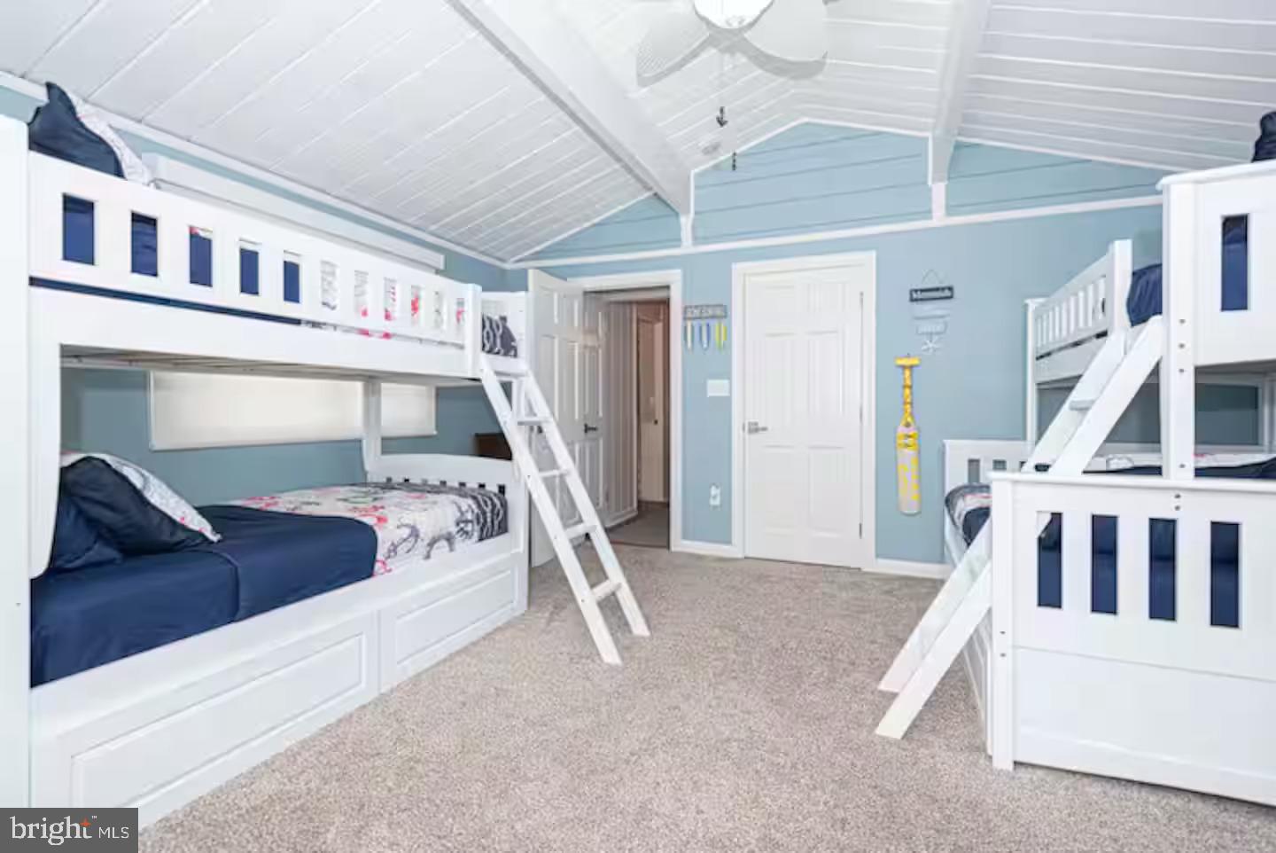 10609 Pine Needle Road Ocean City, MD 21842 - Photo 6 of 26 a view of livingroom with furniture and staircase