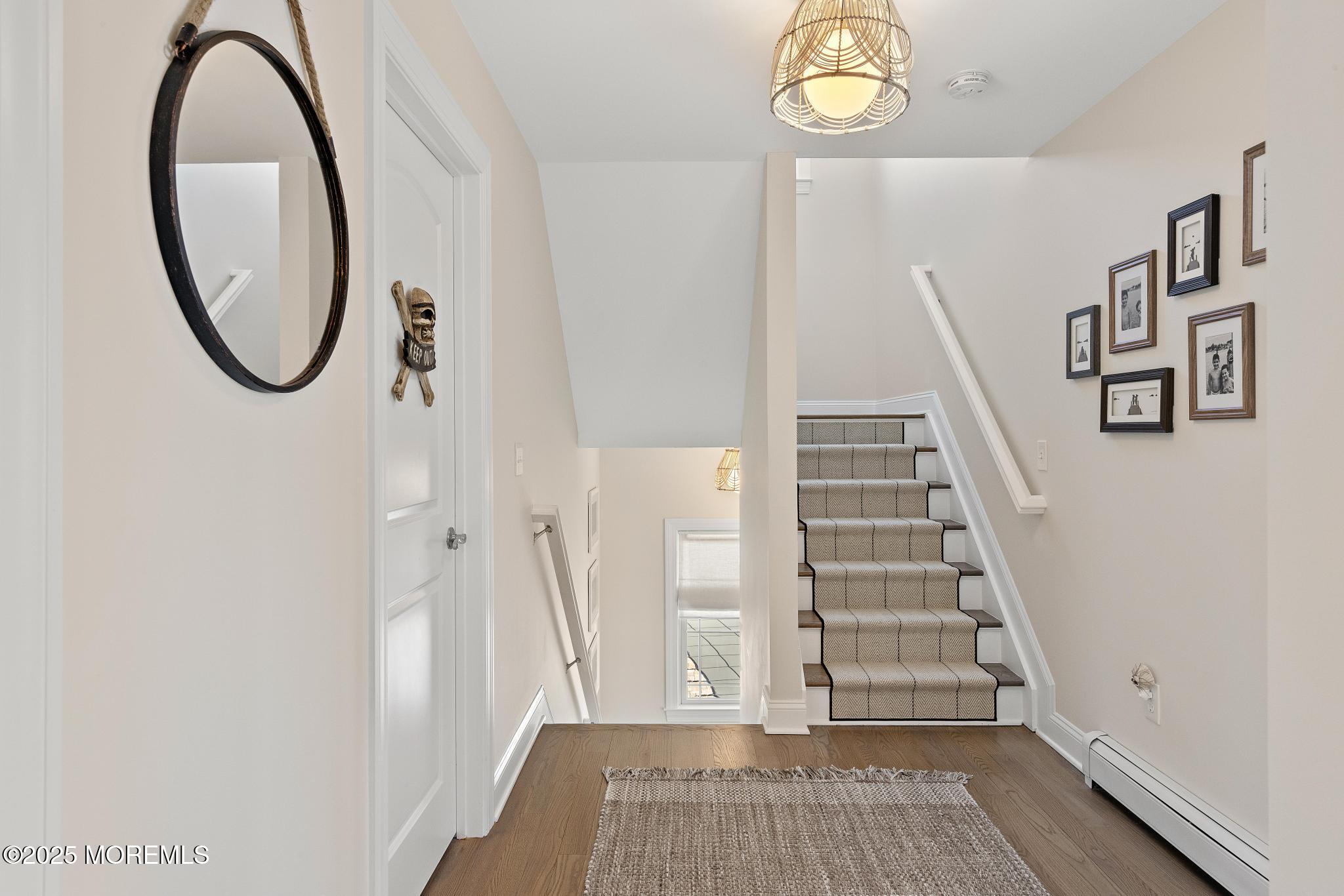 55 Bay Way Brick, NJ 08723 - Photo 11 of 29 a view of a hallway with wooden floor and entryway