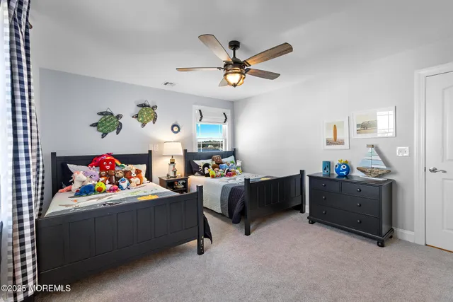 a bed room with a bed and a window