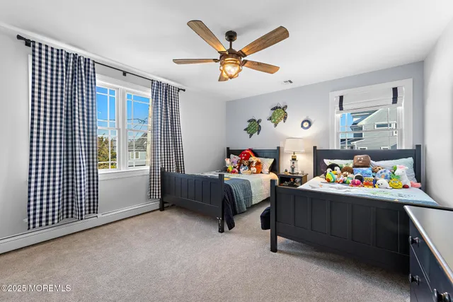 a bed room with a bed and a window