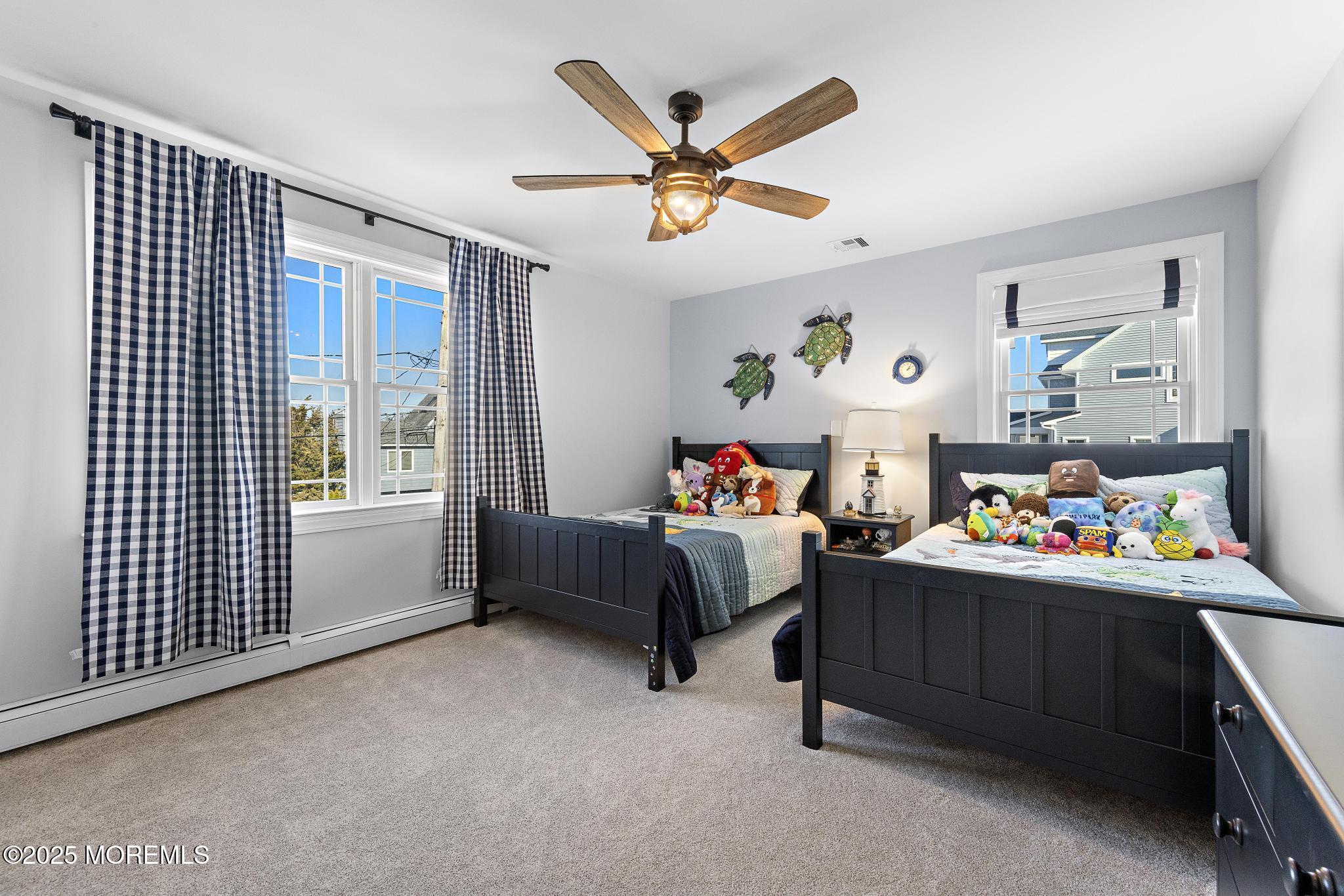 55 Bay Way Brick, NJ 08723 - Photo 14 of 29 a bed room with a bed and a window