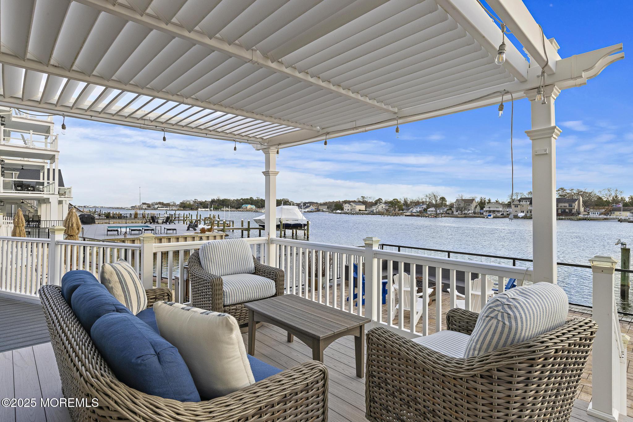 55 Bay Way Brick, NJ 08723 - Photo 20 of 29 a balcony with furniture