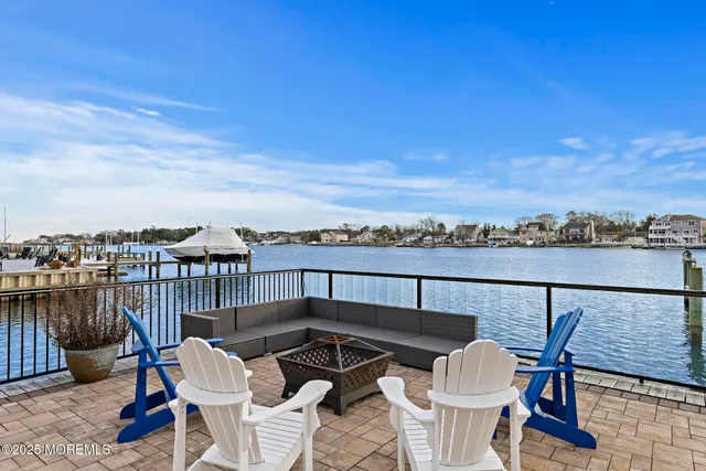 a view of a chairs and table on the terrace