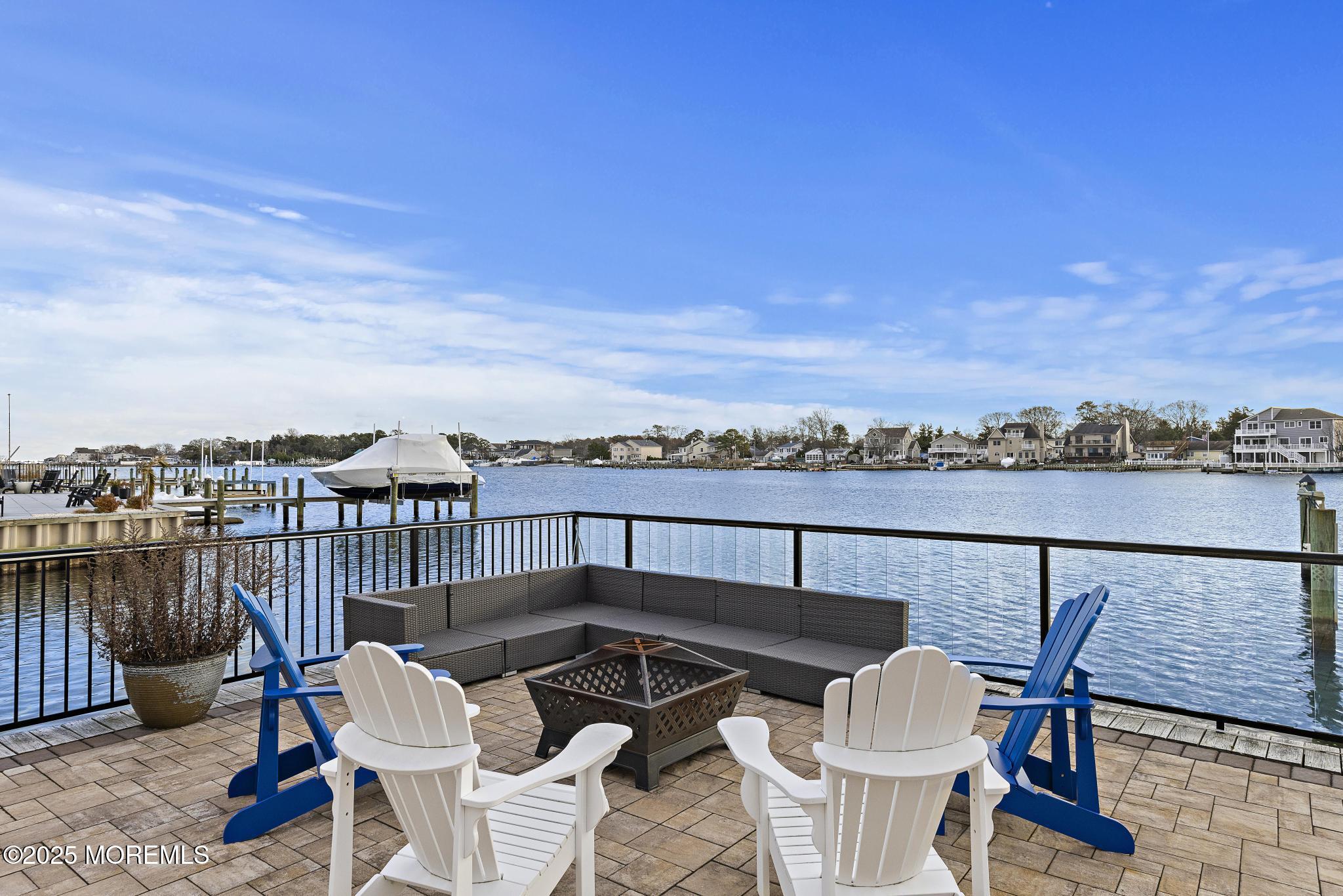 55 Bay Way Brick, NJ 08723 - Photo 21 of 29 a view of a chairs and table on the terrace