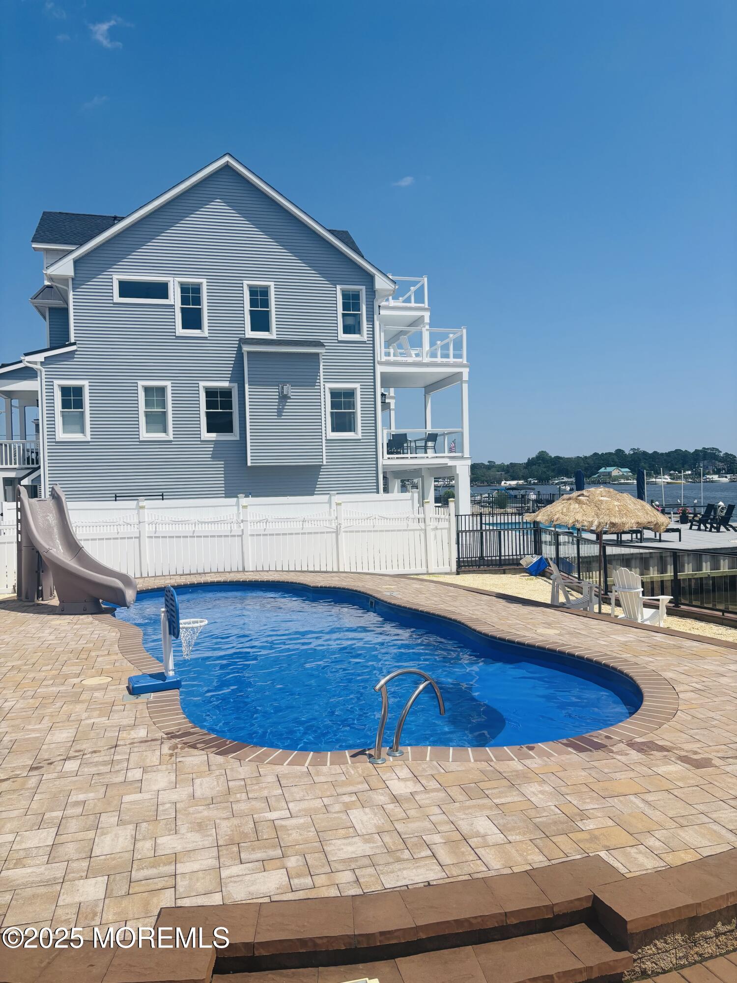 55 Bay Way Brick, NJ 08723 - Photo 25 of 29 a view of a house with swimming pool