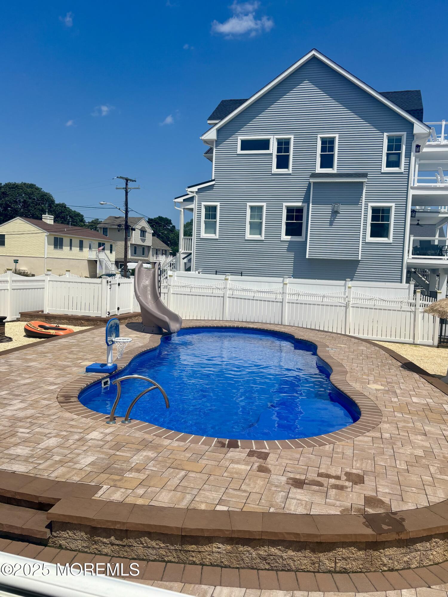 55 Bay Way Brick, NJ 08723 - Photo 26 of 29 a view of a house with swimming pool