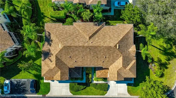 an aerial view of a house with garden