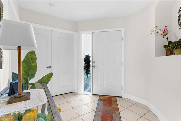 a view of a hallway with entryway