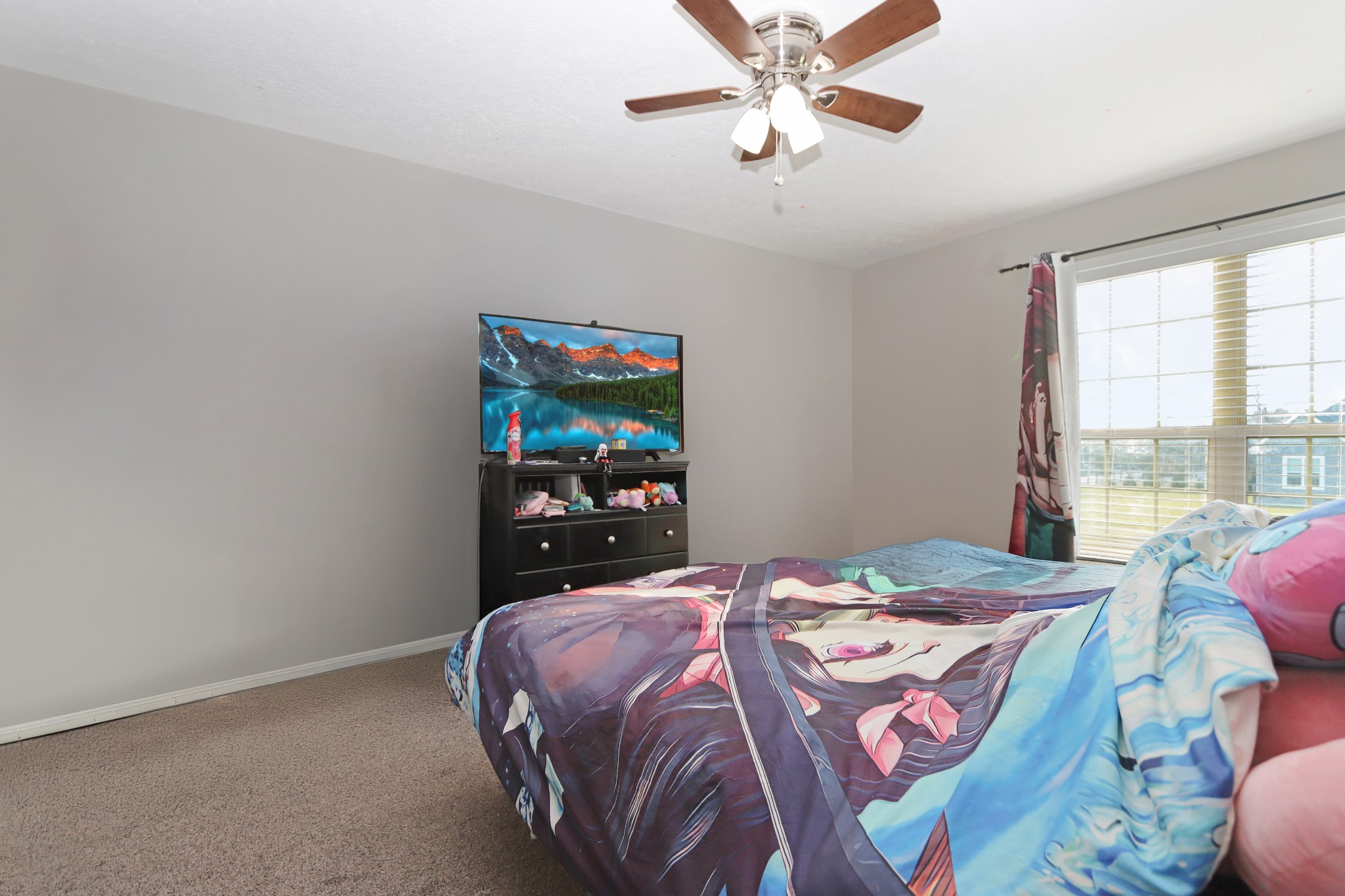 12 Haven Way Westmoreland, TN 37186 - Photo 14 of 16 a bedroom with a bed and a chandelier