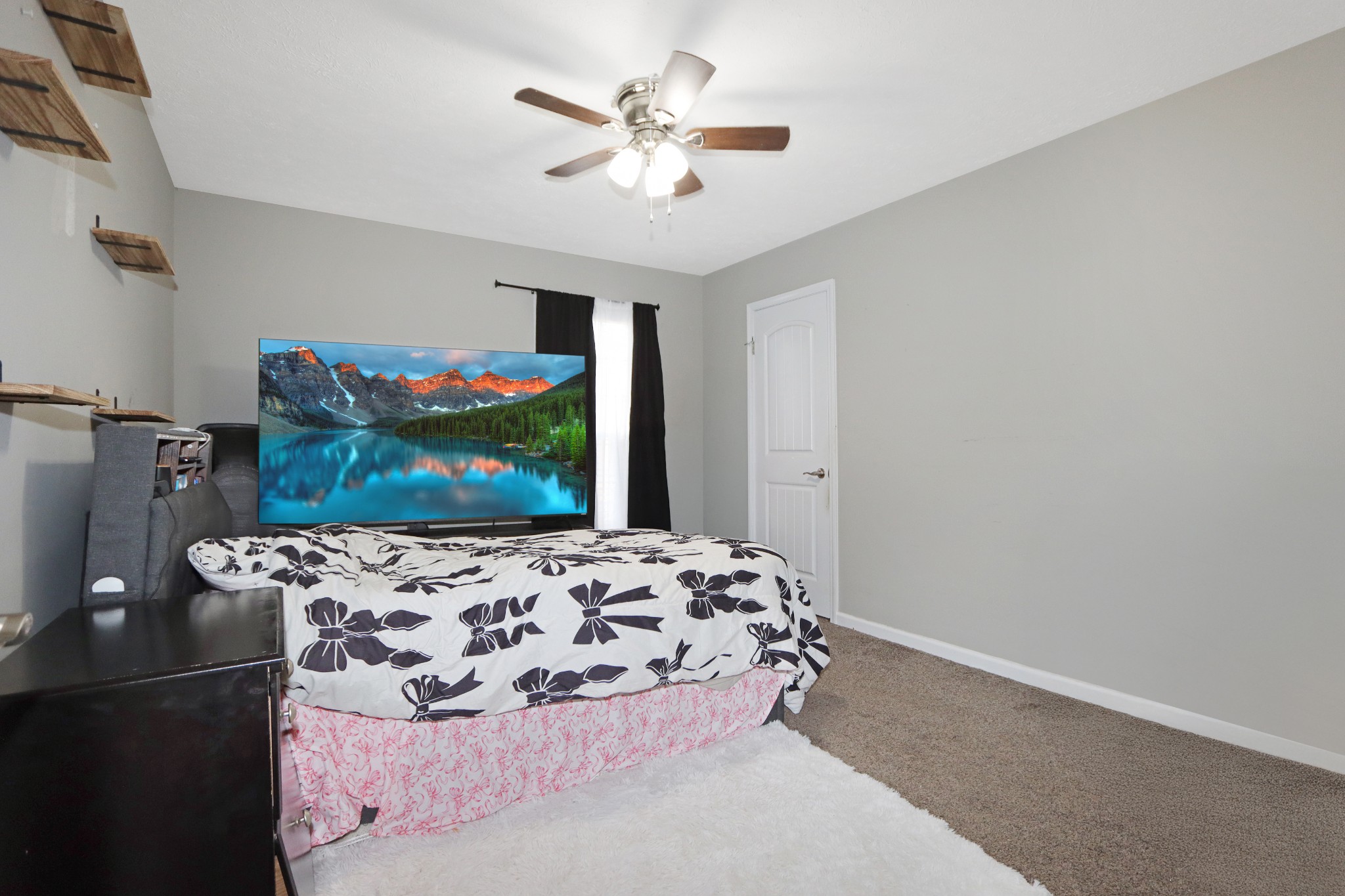 12 Haven Way Westmoreland, TN 37186 - Photo 16 of 16 a bedroom with a bed and ceiling fan