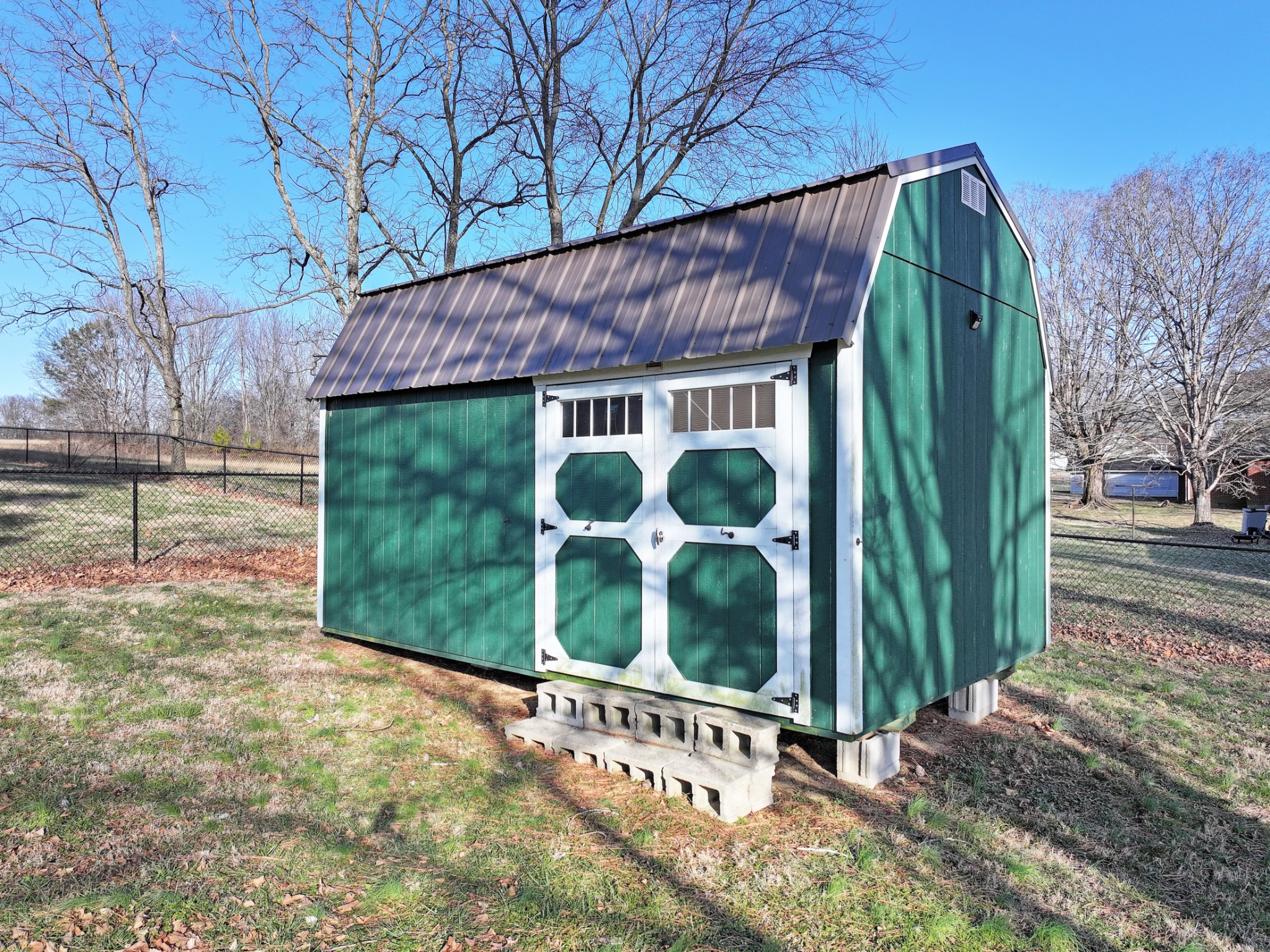 12 Haven Way Westmoreland, TN 37186 - Photo 7 of 16 a view of a house with a small yard and wooden fence