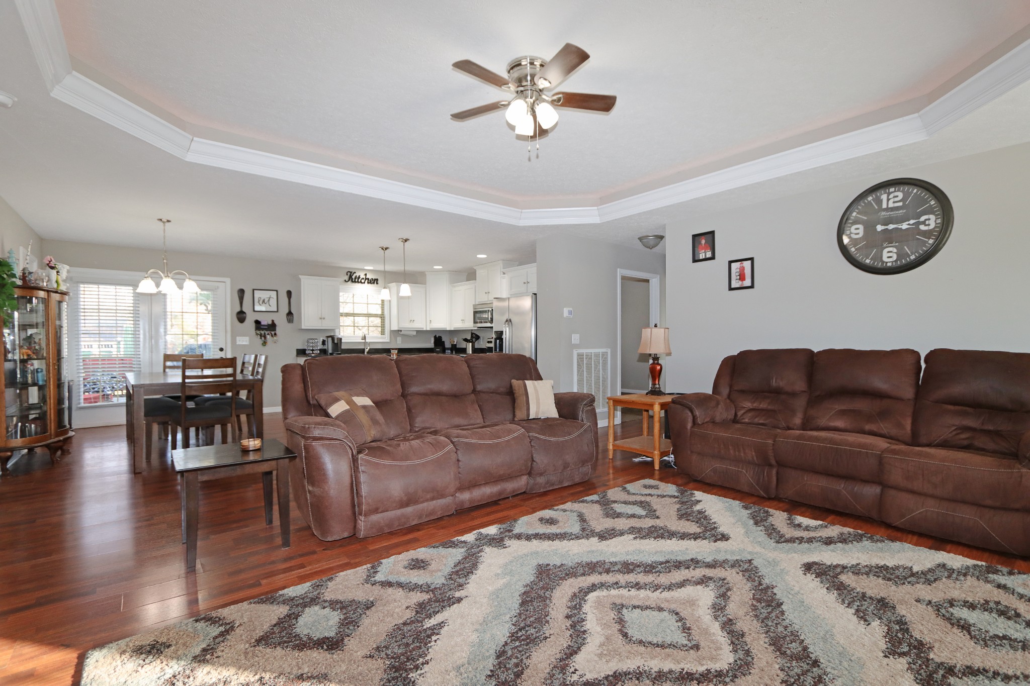 12 Haven Way Westmoreland, TN 37186 - Photo 9 of 16 a living room with furniture a clock on wall and a table