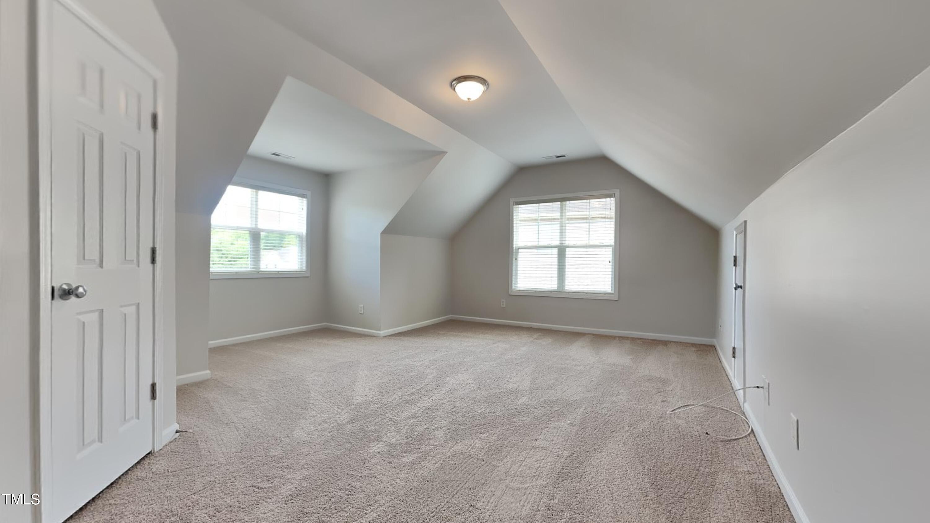 9037 Linslade Way Wake Forest, NC 27587 - Photo 14 of 16 an empty room with windows and closet