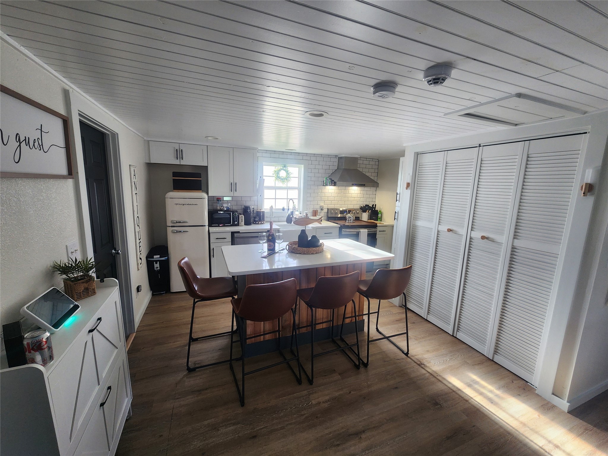 1061 North Sage Road Port Bolivar, TX 77650 - Photo 1 of 21 a view of a dining room with furniture and wooden floor