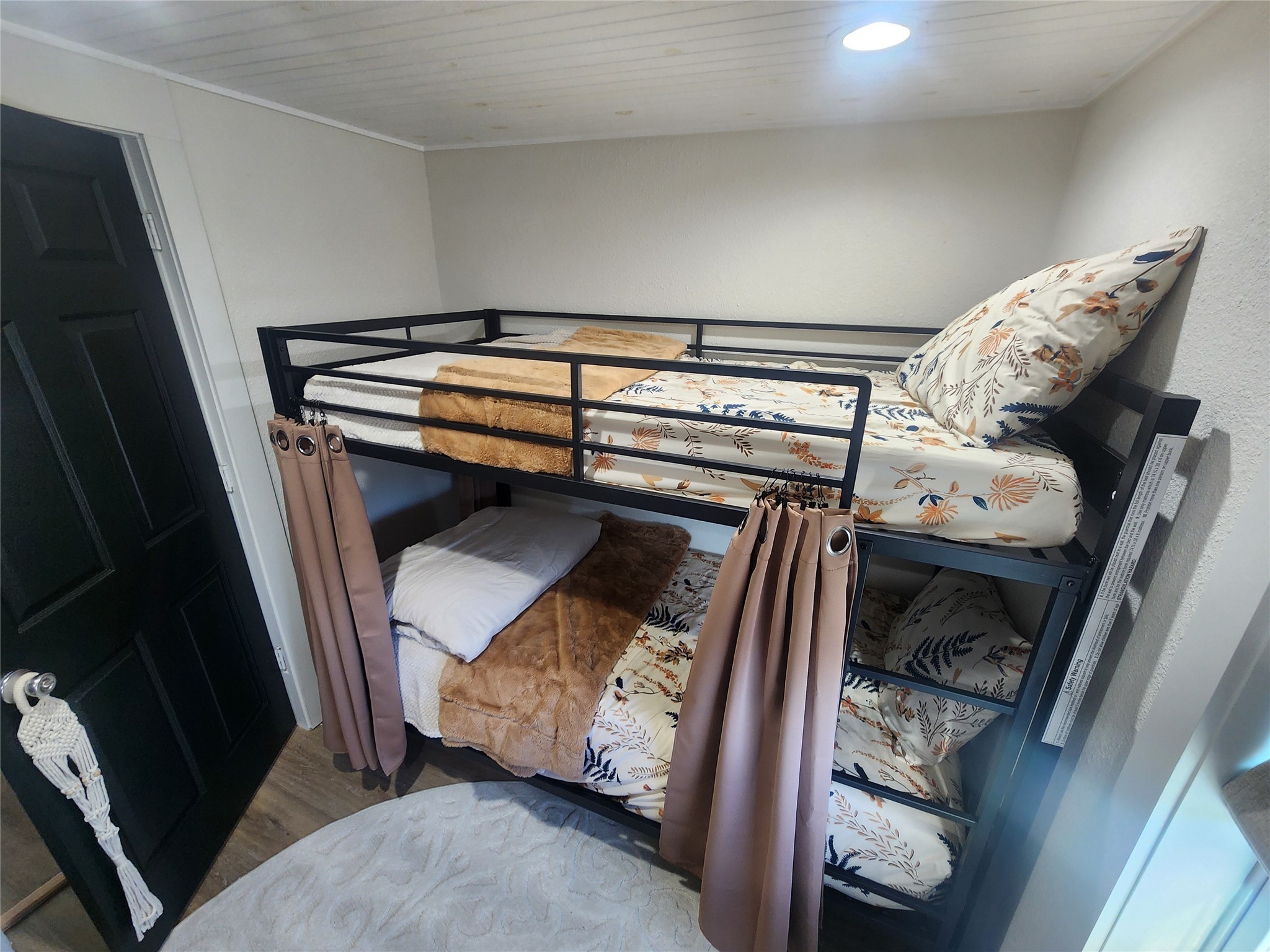 1061 North Sage Road Port Bolivar, TX 77650 - Photo 14 of 21 a view of bedroom with furniture and natural light