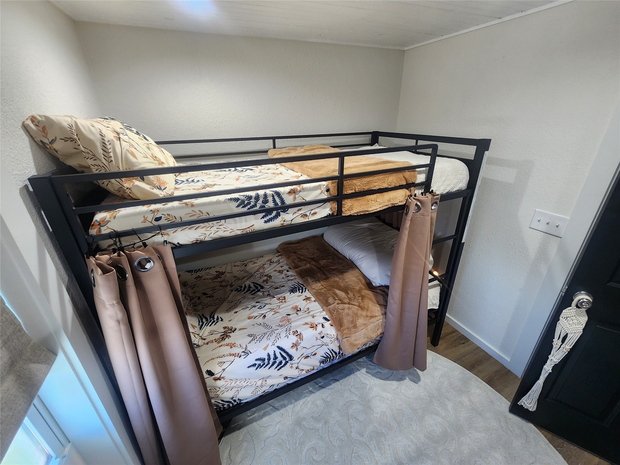 1061 North Sage Road Port Bolivar, TX 77650 - Photo 15 of 21 a view of water heater room with wooden floor
