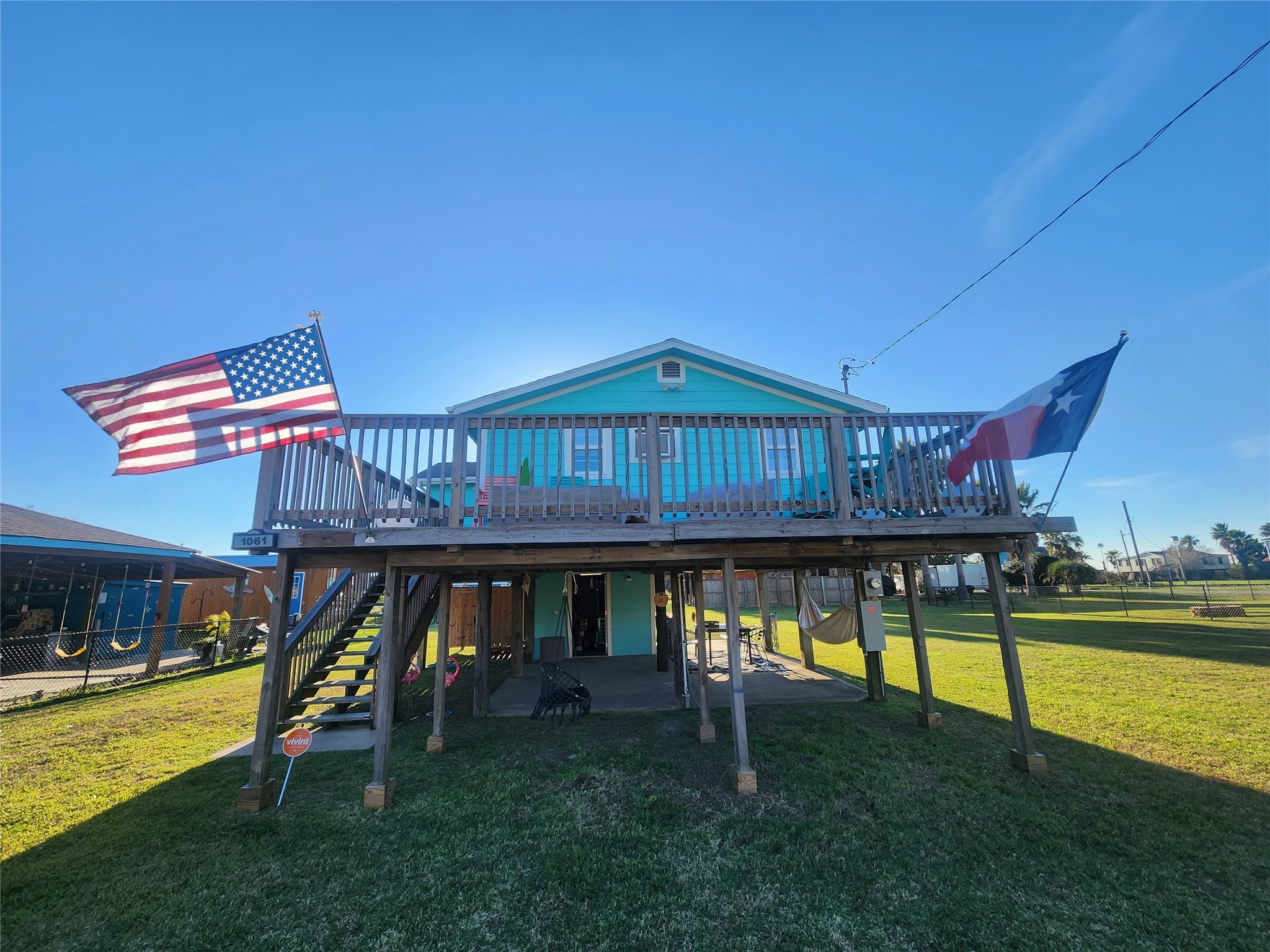 1061 North Sage Road Port Bolivar, TX 77650 - Photo 16 of 21 a view of an chairs with swimming pool in back
