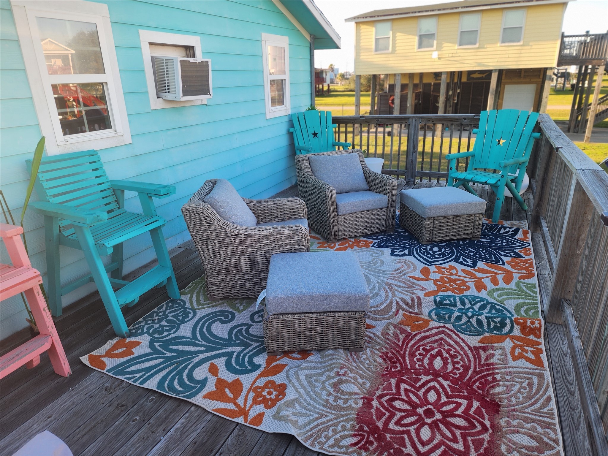 1061 North Sage Road Port Bolivar, TX 77650 - Photo 21 of 21 a couple of chairs sitting in front of a building