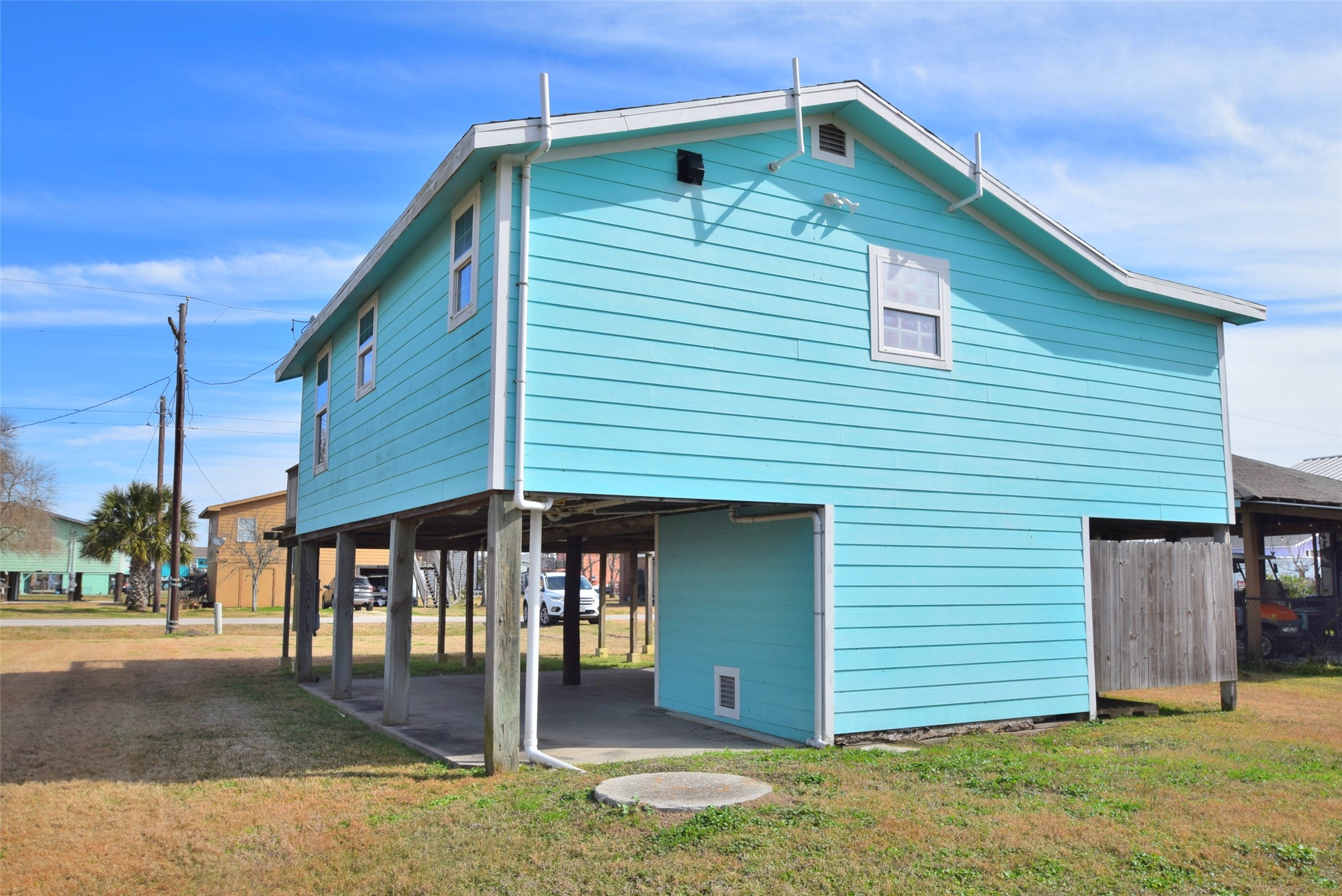 1061 North Sage Road Port Bolivar, TX 77650 - Photo 6 of 21 a front view of a house with garden
