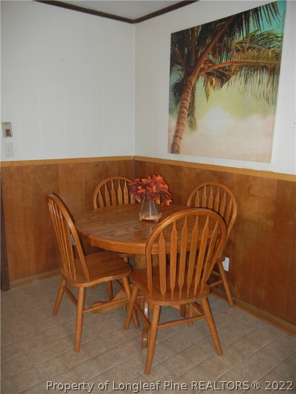 648 Pleasant Loop Fayetteville, NC 28311 - Photo 11 of 20 a table with chairs and a table