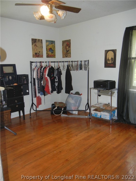 648 Pleasant Loop Fayetteville, NC 28311 - Photo 13 of 20 a view of a room with gym equipment