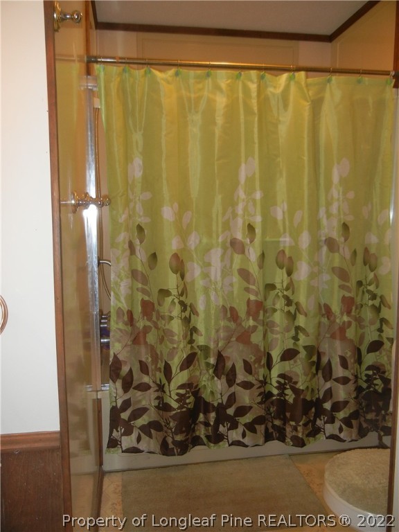 648 Pleasant Loop Fayetteville, NC 28311 - Photo 15 of 20 a view of a bathroom shower