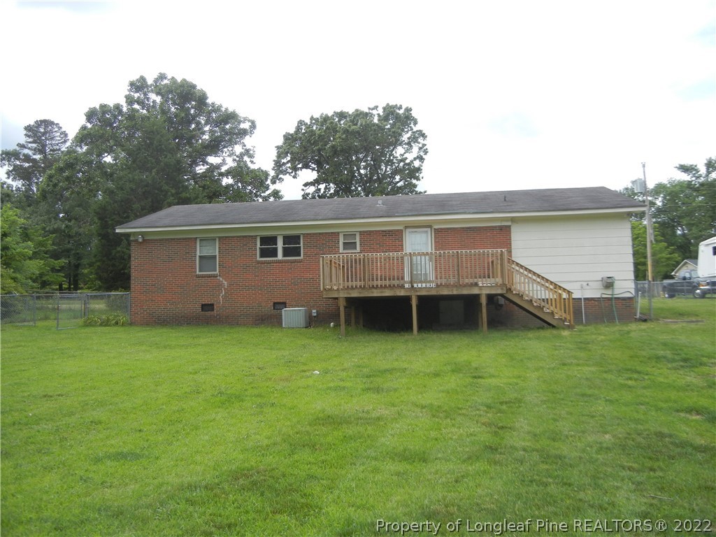 648 Pleasant Loop Fayetteville, NC 28311 - Photo 20 of 20 a view of a house with backyard