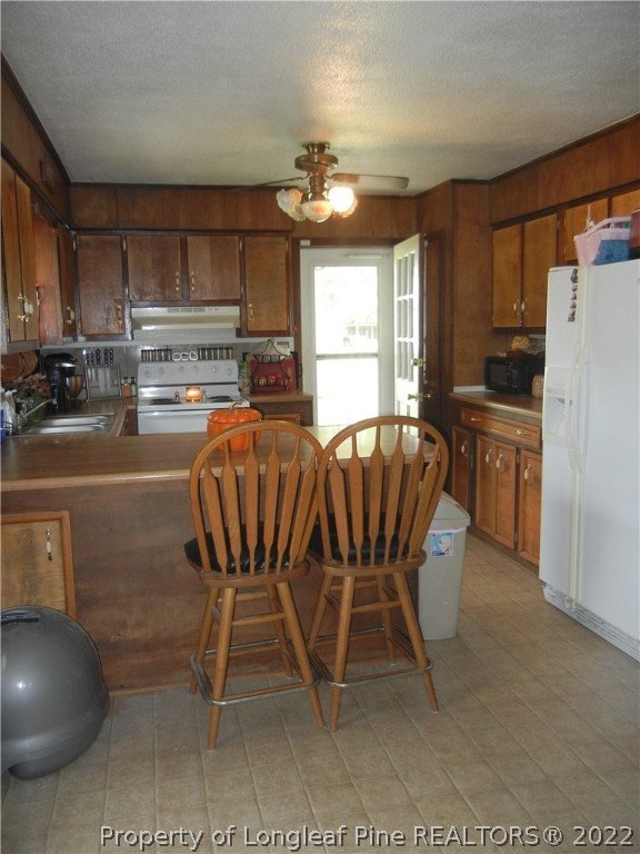 648 Pleasant Loop Fayetteville, NC 28311 - Photo 7 of 20 a dining room with furniture and chandelier kitchen view