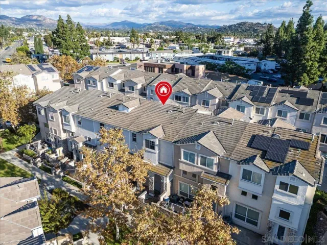 a aerial view of multi story residential apartment building