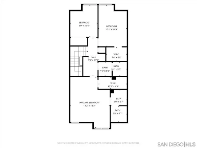 a picture of a bench in front of a wall