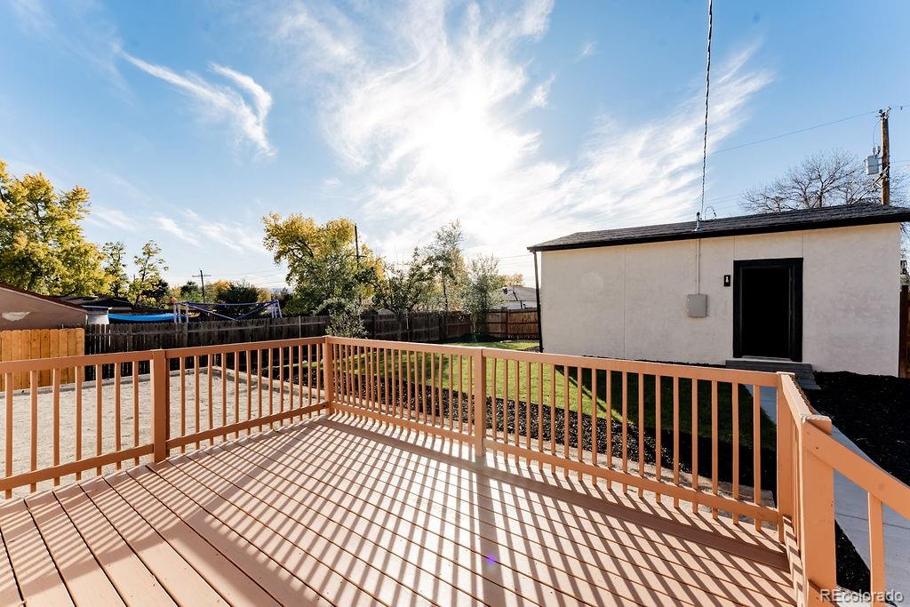 1105 South Raleigh Street Denver, CO 80219 - Photo 4 of 23 a view of balcony with wooden floor