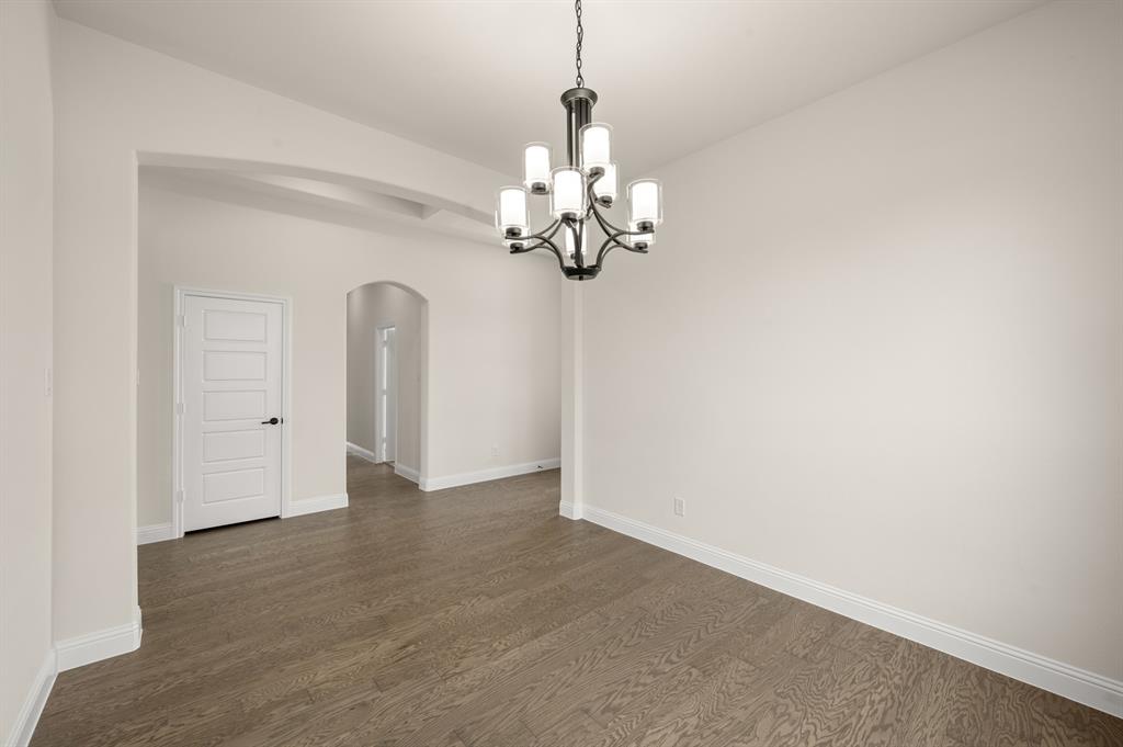 104 Calf Lane Midlothian, TX 76065 - Photo 14 of 29 a view of a chandelier in big room and chandelier
