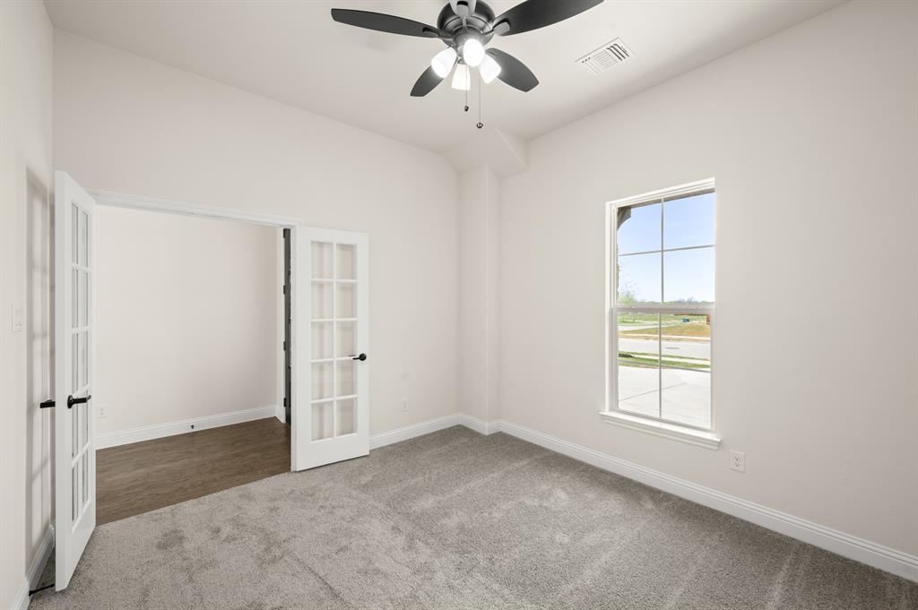 104 Calf Lane Midlothian, TX 76065 - Photo 17 of 29 a view of an empty room with a window