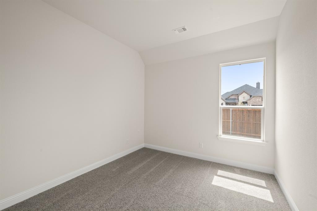 104 Calf Lane Midlothian, TX 76065 - Photo 20 of 29 an empty room with a window