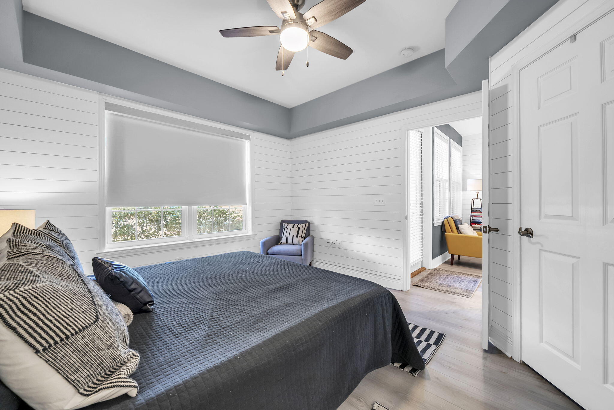 117 Village Boulevard, Unit 711 Santa Rosa Beach, FL 32459 - Photo 23 of 47 a bedroom with a bed and a chandelier