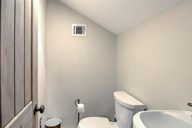 a view of staircase with lots of wooden floor and windows