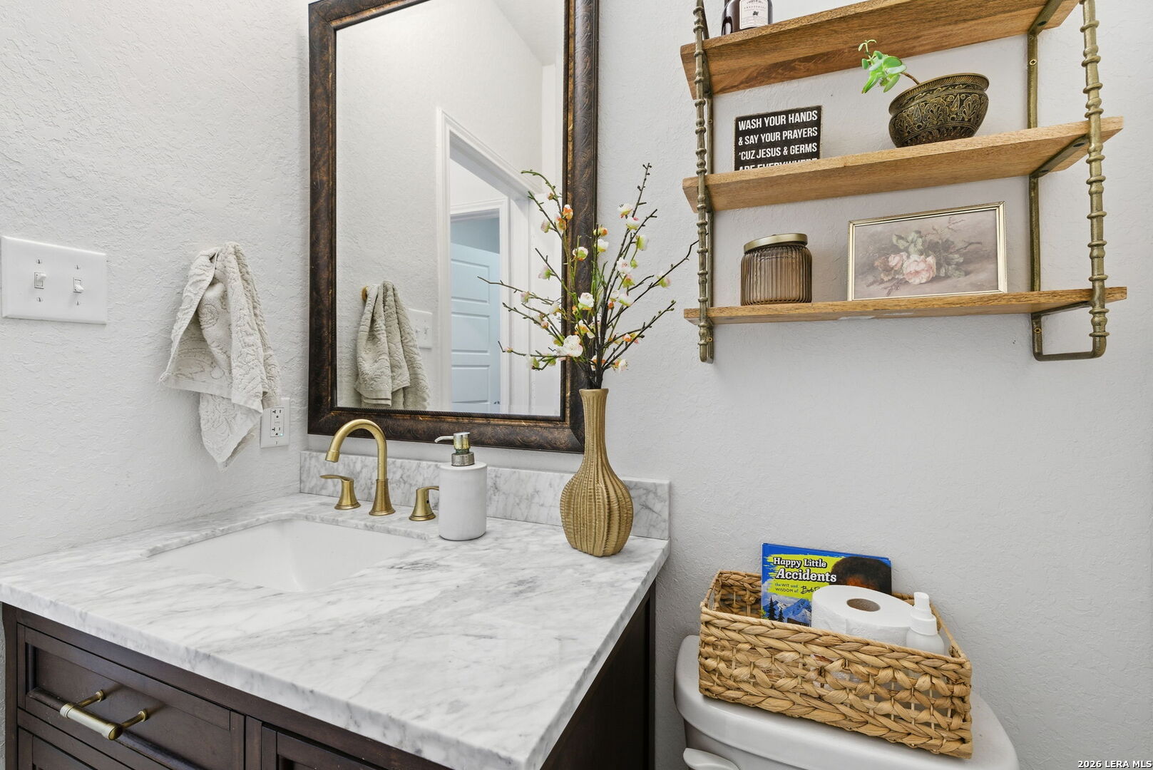 3410 Copper Acres Bulverde, TX 78163 - Photo 19 of 50 a bathroom with a sink and a mirror