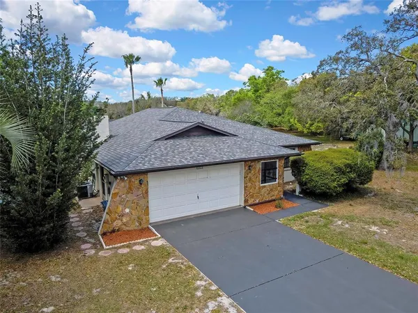 $299,000 | 1021 Waterfall Drive, Spring Hill, FL 34606