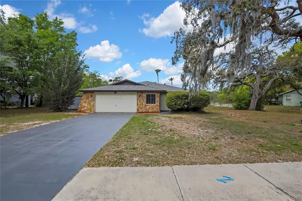 $299,000 | 1021 Waterfall Drive, Spring Hill, FL 34606