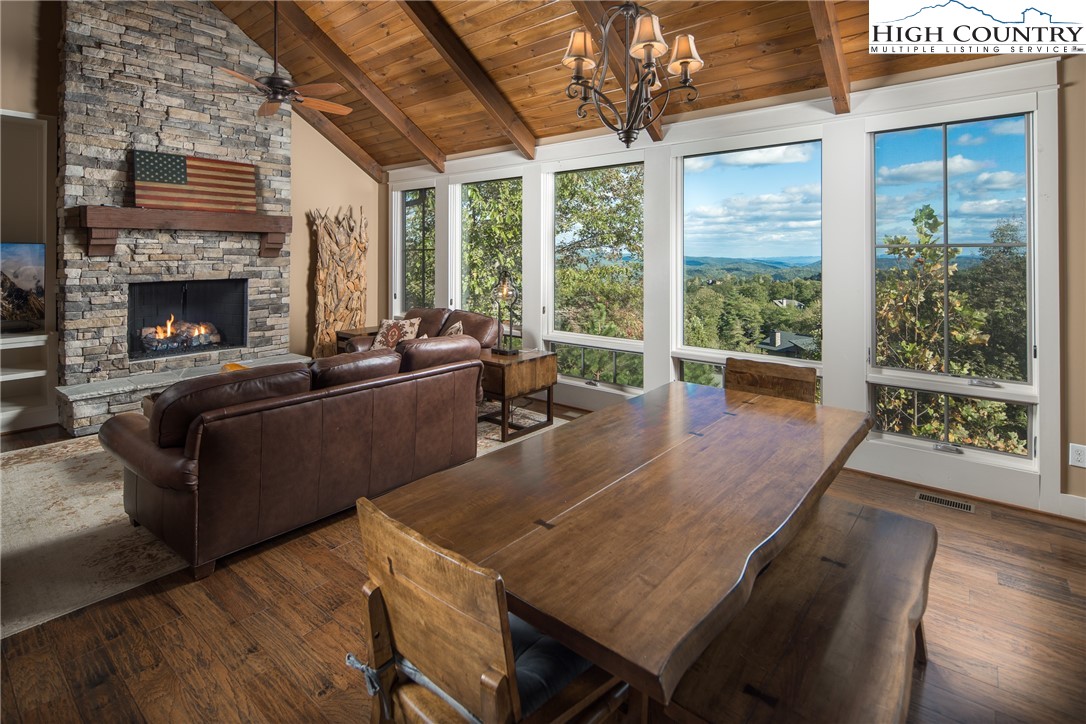 1253 Goldenrod Road Boone, NC 28607 - Photo 5 of 48 a living room with furniture and a fireplace