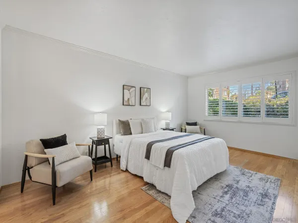 a bed room with a bed and a couch