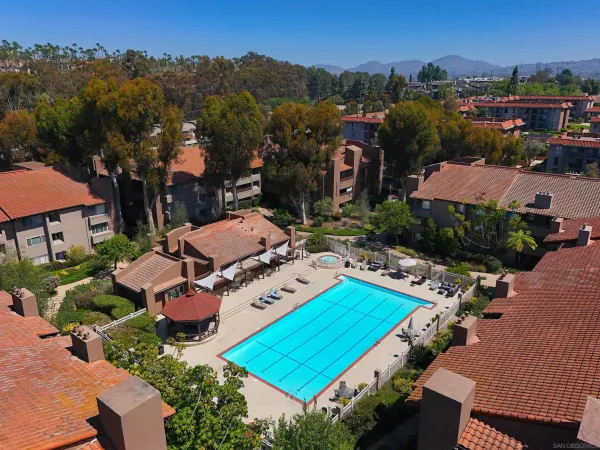 an aerial view of a house with a garden