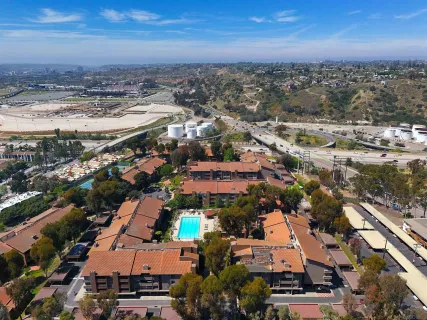 an aerial view of residential building with parking space