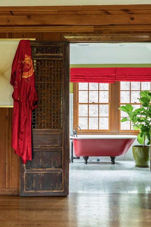 107 Independence Road Concord, MA 01742 - Photo 15 of 25 a bed sitting in a bedroom next to a window