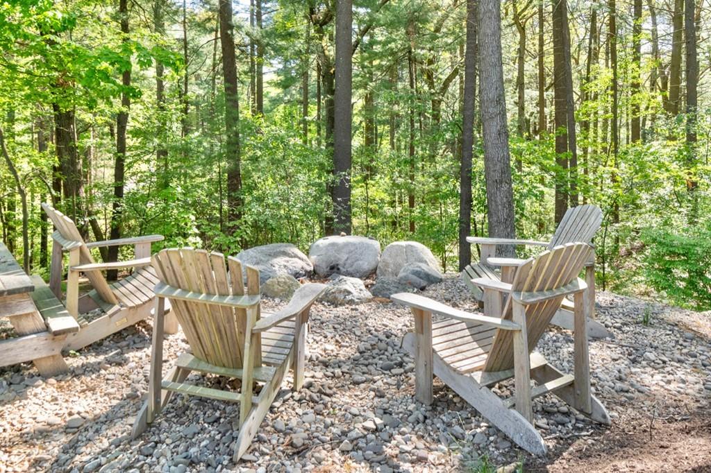 107 Independence Road Concord, MA 01742 - Photo 21 of 25 a view of a chairs and table in the patio