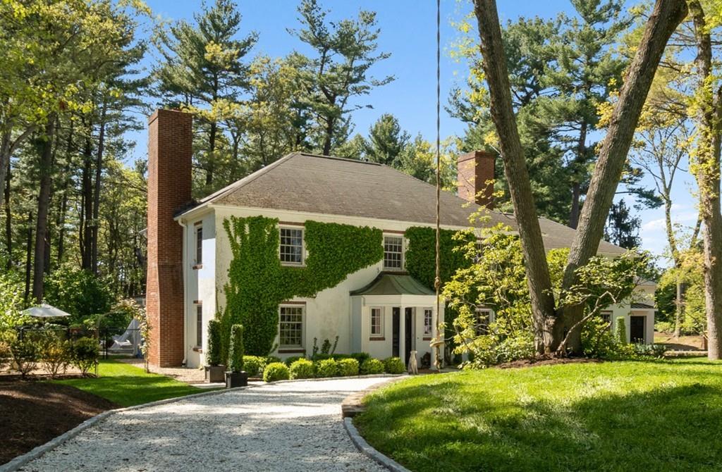 107 Independence Road Concord, MA 01742 - Photo 23 of 25 a front view of a house with a yard