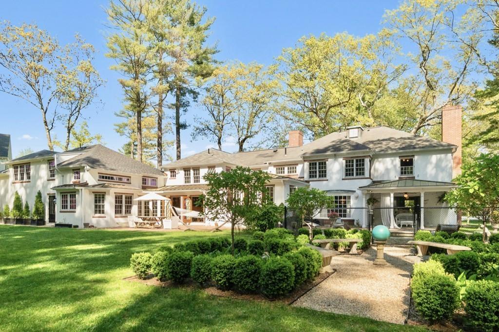 107 Independence Road Concord, MA 01742 - Photo 25 of 25 a front view of a residential apartment building with a yard