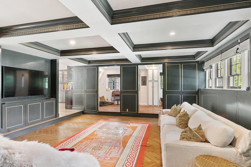 107 Independence Road Concord, MA 01742 - Photo 7 of 25 a living room with furniture and a flat screen tv